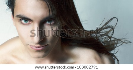 Long haired male model portrait