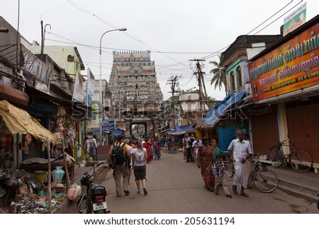 TRICHY, INDIA-FEBRUARY 14: Street of Indian city 14, 2013 in Trichy, India. People on the street of indian town