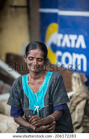 MADURAI, INDIA-FEBRUARY 15: Indian woman feb 15, 2013 in Madurai, India. Woman on the street of Indian town.