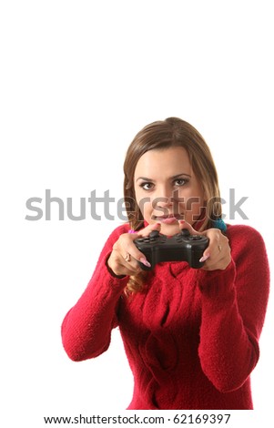 Girl play computer game with helping of a gamepad