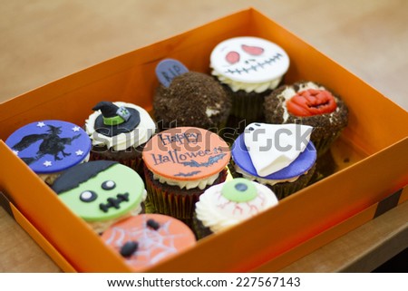 Delicious cakes for Halloween. Zombie, witch, ghost, pumpkin, grave.
