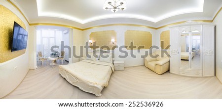 Luxurious bed with cushion in royal bedroom interior. Panorama hotel room in gold tones