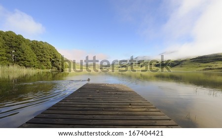 Wooden Jetty at Giant\'s Cup Wilderness Reserve, a popular but exclusive fly-fishing resort in the Drakensberg, Kwazulu Natal, South Africa