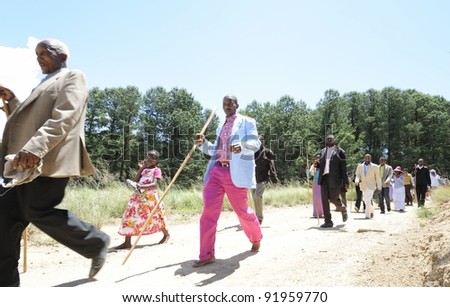 GOSCHEN, SOUTH AFRICA - DECEMBER 25, 2011. Zulu devotees of the Ikanya Mission Church undertake a pilgrimage in the Drakensberg on December 25, 2011 in Kwazulu Natal, South Africa