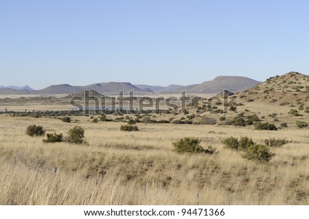 karoo scene, northern cape, south africa.  the karoo was once a vast paleolithic inland sea. the area has a unique geology and  is rich in fossils