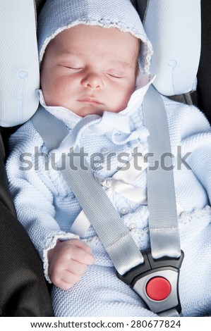 New born in the car using seat belt