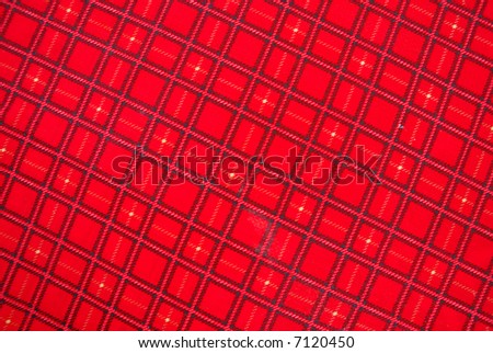 Red Tablecloth with black square lines .