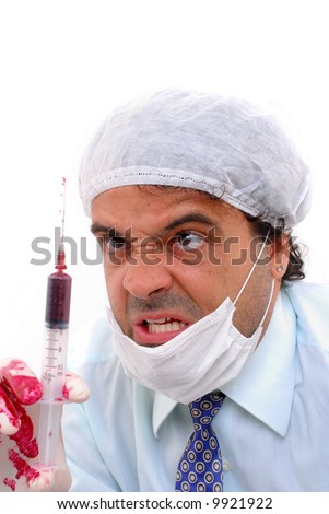 stock-photo-angry-doctor-holding-a-syringe-with-medicine-9921922.jpg