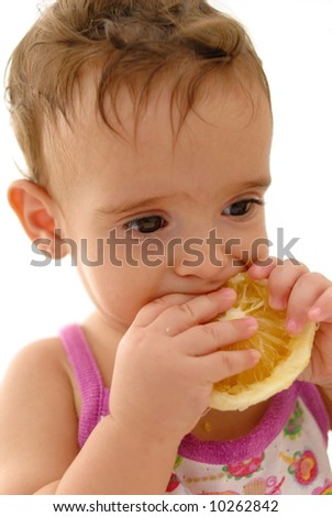 Baby Eating Orange