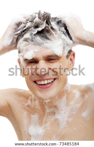 stock photo Naked man with shampoo over hair in shower isolated on white