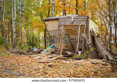 Abandoned and ruined cottage in the woods. Now it is only a fall.