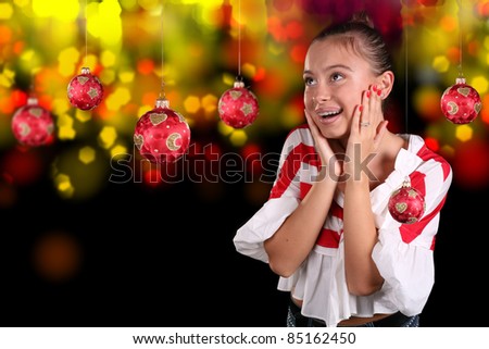 Vibrant, colorful series with a woman over a sparkly holiday background. Professional makeup applied for this session. Good for dropping in text for an advertisement.