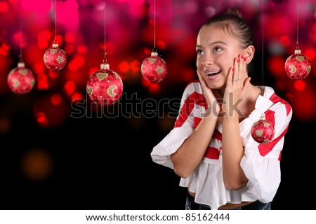 Vibrant, colorful series with a woman over a sparkly holiday background. Professional makeup applied for this session. Good for dropping in text for an advertisement.