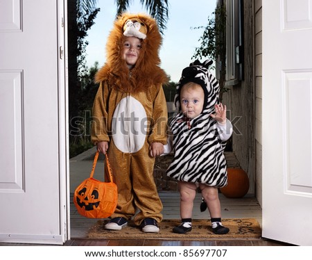 Trick or Treat; adorable children dressed up for Halloween