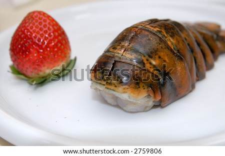 preparing fresh food: strawberry and  lobster