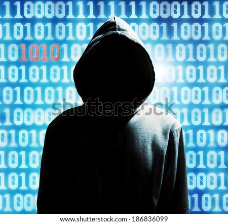 a hacker with a hood over a background with binary code
