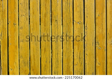 yellow wooden planks fence