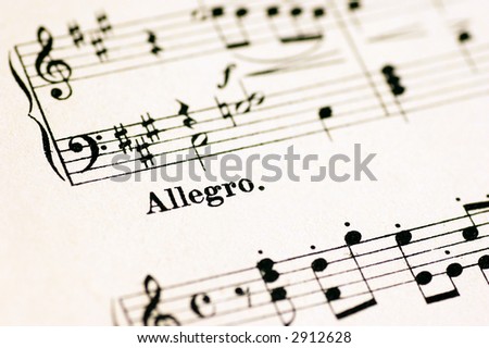 close-up on the word Allegro in a music sheet