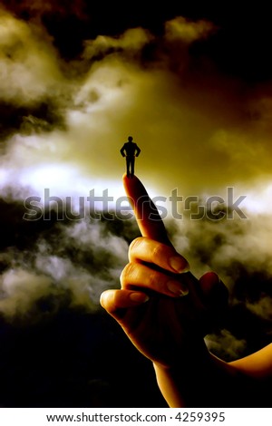 businessman standing on the top of a woman finger with a dramatic sky in background