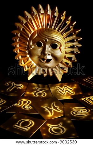 mystical sun with astrological symbols in yellow tonality