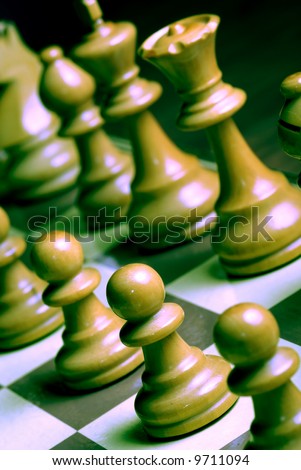 detail of chess pieces on the board at the start of game