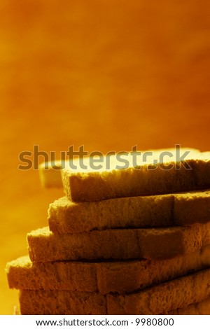 pile of toasted bread for breakfast in warm golden light