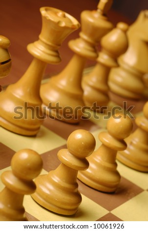 detail of chess pieces on the board at the start of game