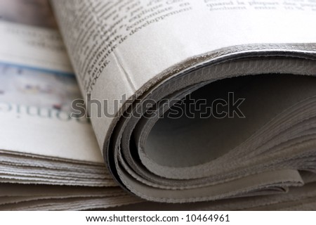 close up detail of a folded newspaper