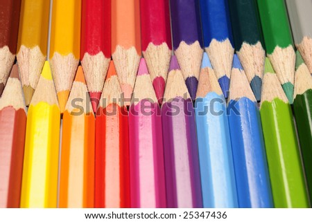 set of art color pencils interwoven