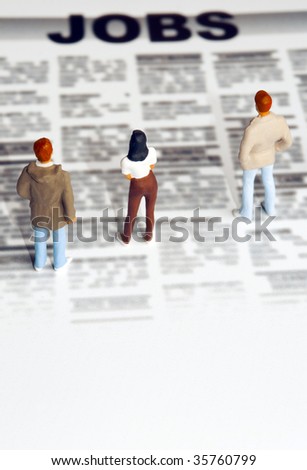 miniature figurine of people standing in front of jobs  seeking offerings