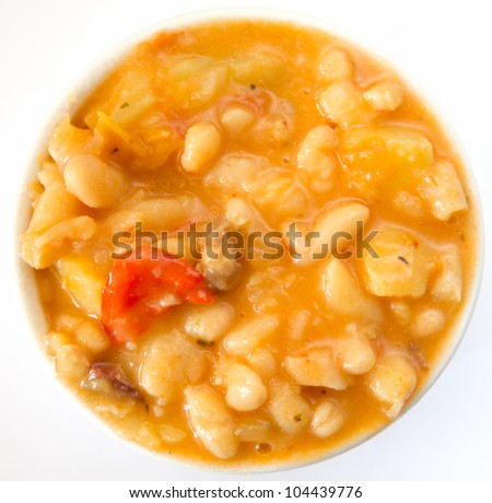 spanish typical cooked bean stew served with pepper