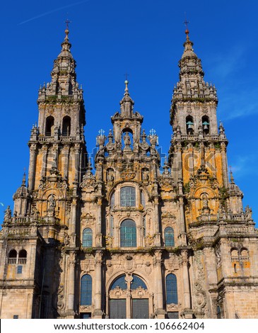 Facade of Cathedral of Santiago de Compostela with blue sky