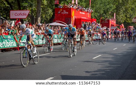 MADRID - SEPTEMBER 9: Spanish Vuelta (cycling), Alejandro Valverde (Left, white jersey) finishing the last stage of the Vuelta on September 9, 2012 in Madrid (Spain).