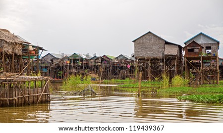 Homes on stilts and wooden cages on the floating village of Kampong Phluk, Tonle Sap lake,Siem Reap province, Cambodia