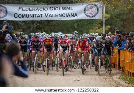 VALENCIA - DECEMBER 16: Aitor Hernandez (number 4, and finally winner)  starts participation in XXVII edition of Cyclo-cross city of Valencia on December 16, 2012 in Valencia, Spain