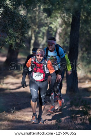 CASTELLON - FEBRUARY 24: Raul Belinchon Hueso (number 277) leads group in his participation in XV Edition of Espadan mountain marathon on February 24, 2013 in Castellon, Spain