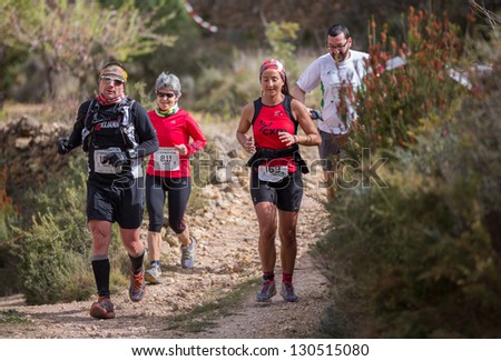 CASTELLON - FEBRUARY 24: Laura Herrera Perez (number 169) leads group in his participation in XV Edition of Espadan mountain marathon on February 24, 2013 in Castellon, Spain