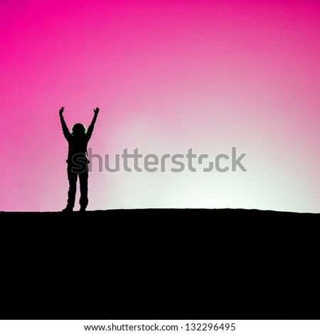 Woman hands up against the light over dune, Pink sky