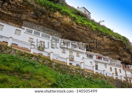 high slope street under the rocks in Setenil de las Bodegas, Cadiz