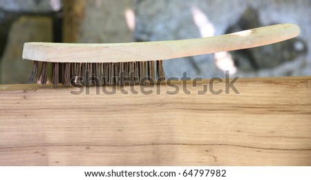 Wire brush over wood