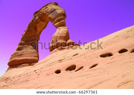 Back side of Delicate arch with purple sky, arches national park, utah