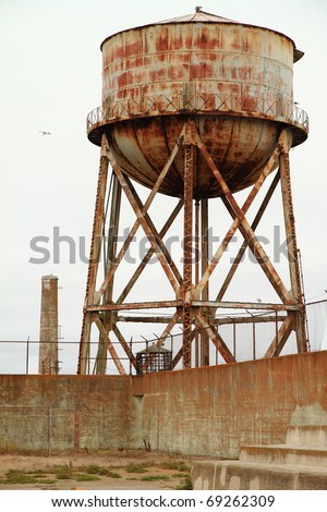 Rusty Water Tank in alcatraz on a cloudy day