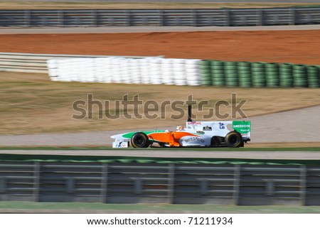 CHESTE, SPAIN - FEBRUARY 1: Formula 1 in Cheste (Spain) - Force India F1 Team driver Nico Hulkenberg in 2011 first official training day on February 1, 2011 in Cheste (Valencia), Spain