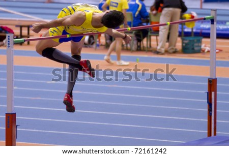VALENCIA, SPAIN - FEBRUARY 20: High jump competitor of high jump Men of the spanish indoor national championships at Valencia on February 20, 2011 in Valencia, Spain