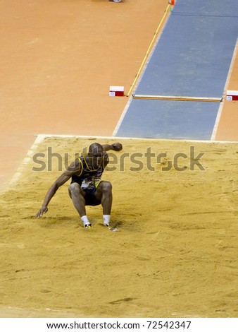 VALENCIA, SPAIN - FEBRUARY 19: An unidentified athlete competes in the long jump for men at the Spanish Indoor National Championships at Valencia on February 19, 2011 in Valencia, Spain