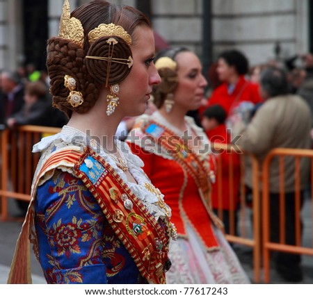 VALENCIA, SPAIN - MARCH 16: Unidentified women walk in the presentation of the Fallas, one of the biggest parties in Spain where people dress in vintage clothing on March 16, 2011 in Valencia, Spain