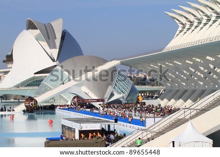 VALENCIA - NOVEMBER 27: Runners at Finish line of Marathon race at the incredible environment of Palace of Arts, Santiago Calatrava's architect famous buildings on November 27, 2011 in Valencia, Spain