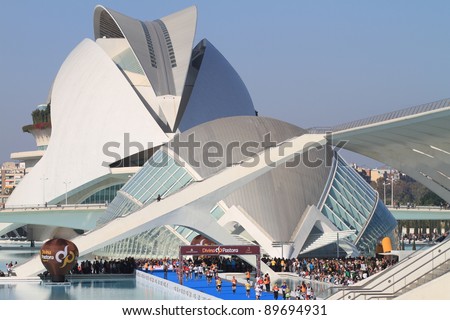 VALENCIA - NOVEMBER 27: Runners at Finish line of Marathon race at the incredible environment of Santiago Calatrava's architect famous buildings on November 27, 2011 in Valencia, Spain