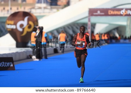 VALENCIA - NOVEMBER 27: CHESIRE, JACOB (number 18) finalizing the mens marathon at finish line in Valencias Marathon on November 27, 2011 in Valencia, Spain