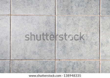 Close up of grey square tiles as a background